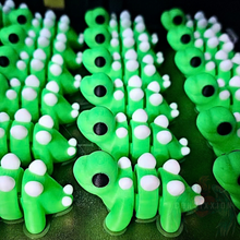 Load image into Gallery viewer, Convixxion Glow-in-the-Dark Articulated Stegosaurus Desk Fidget Figure - Tiny Stego Desk Accessory