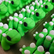 Load image into Gallery viewer, Convixxion Glow-in-the-Dark Articulated Stegosaurus Desk Fidget Figure - Tiny Stego Desk Accessory