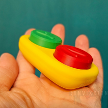 Load image into Gallery viewer, Side view of the Yes No Button Fidget Clicker