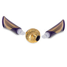 Load image into Gallery viewer, Harry Potter Golden Snitch lip balm duo by Mad Beauty, shown disassembled with a gold Snitch-shaped center container and two purple and gold striped squeeze tubes on a white background.