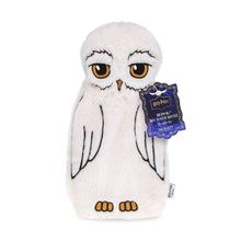 Load image into Gallery viewer, Harry Potter Hedwig hot water bottle cover by Mad Beauty, shaped like a soft white owl with embroidered eyes, wings, and feet, shown on a white background.