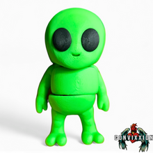Load image into Gallery viewer, Green Alien Articulated Figure Fidget made by Convixion, standing and looking at the viewer.