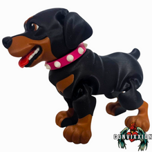 Load image into Gallery viewer, Side view of articulated Rottweiler figure with pink and white spiked collar, showing smooth linked articulation and solid stance – Convixxion