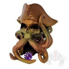 Load image into Gallery viewer, Front view of the Convixxion Pirate Captain Skull Dice Tower with tentacles emerging from its mouth a purple die. A legendary skull-themed dice tower perfect for tabletop gaming.