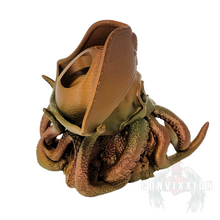 Load image into Gallery viewer, Right side view of the Convixxion Pirate Captain Skull Dice Tower with tentacles emerging from its mouth. A legendary skull-themed dice tower perfect for tabletop gaming.