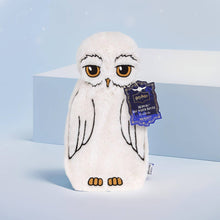 Load image into Gallery viewer, Mad Beauty Harry Potter Hedwig plush hot water bottle with soft white faux fur and embroidered owl details.

