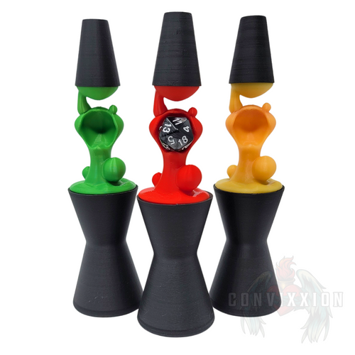 A group of three Lava Lamp Dice Holders in green, red, and yellow. The red holder is displaying a die in the middle, while the others have their caps on.