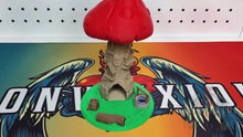 Load and play video in Gallery viewer, The video begins by showcasing the Toadstool Manor Dice Tower from various angles, highlighting its unique design and custom base. In the second half, a dice is rolled through the tower, demonstrating its functionality.
