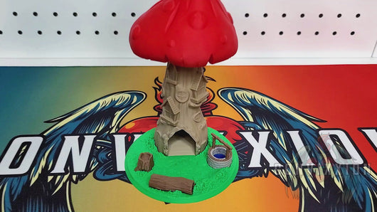 The video begins by showcasing the Toadstool Manor Dice Tower from various angles, highlighting its unique design and custom base. In the second half, a dice is rolled through the tower, demonstrating its functionality.